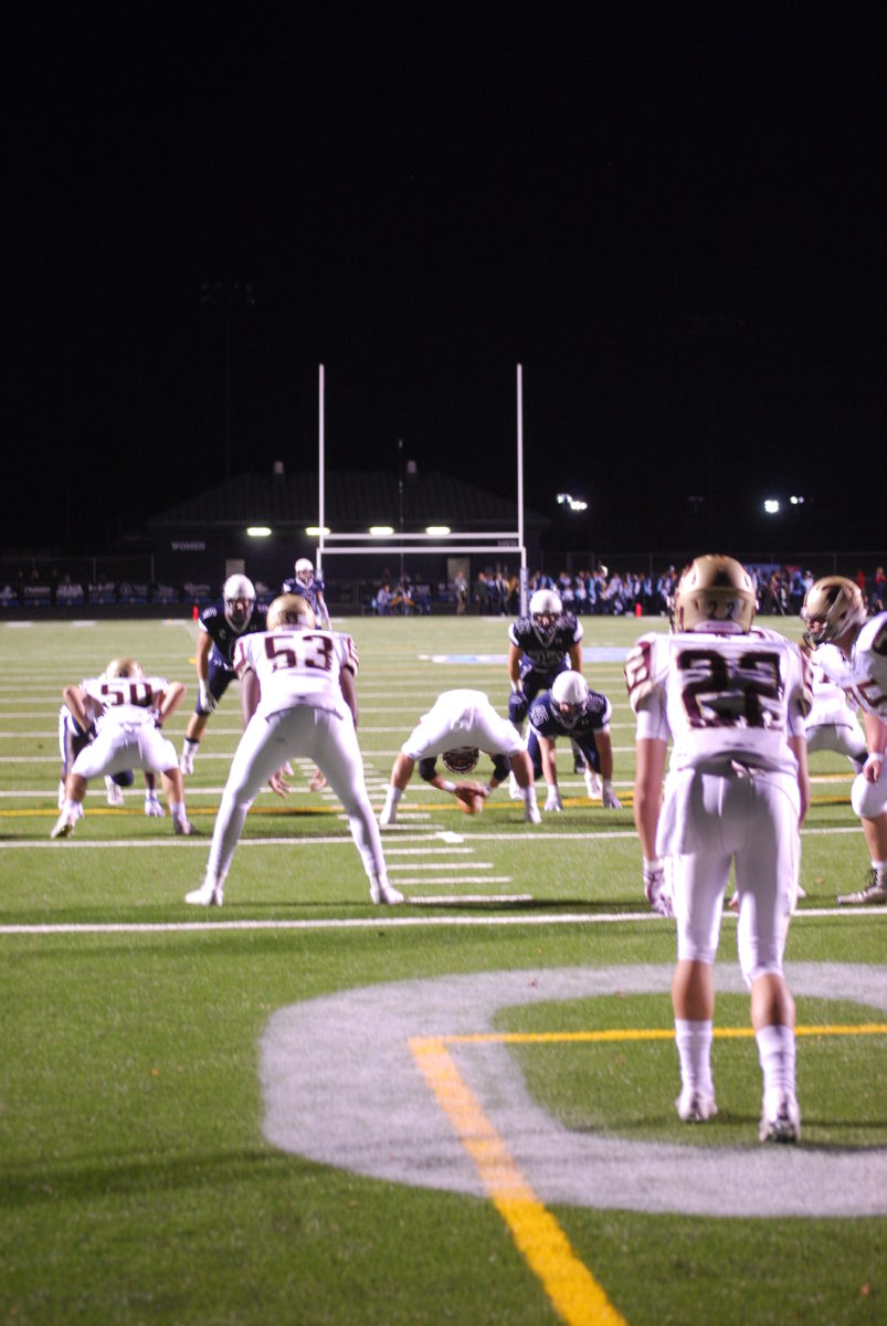 The Stone Bridge defense turned in stop after stop and forced a number of Broad Run punts in the Bulldogs' upset win on October 16. Photo by Joe Skinner.