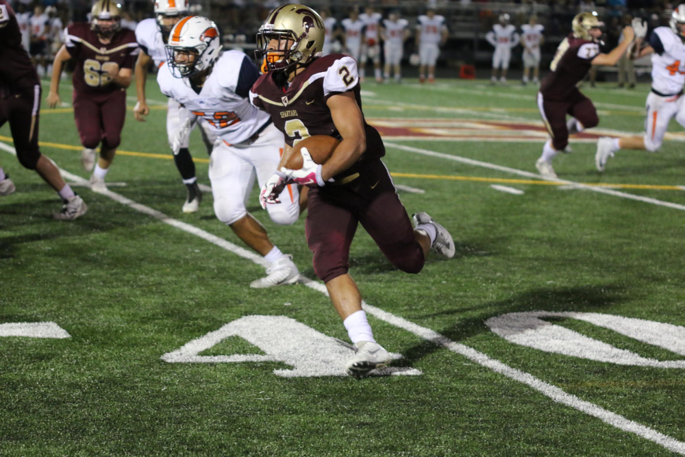 Broad Run senior running back Meech Hembry ran for four touchdowns in the Spartans' win against crosstown-rival Briar Woods. Photo by Dave Harmon.