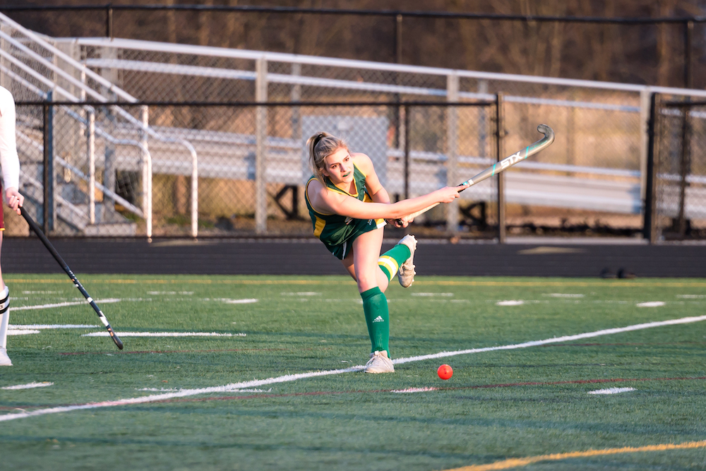 Loudoun Valley junior defender Carlea Dawson hits the ball during a game